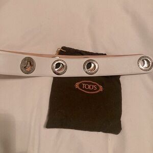 Tod’s beautiful leather belt with grommets . White rare and luxury